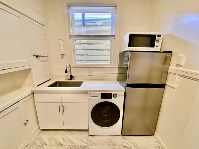 Building Photo - Bright, Renovated 1BD with In-Unit W/D and...