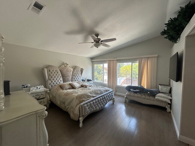 Building Photo - Upgraded 4-Bedroom Home in Gated Green Riv...