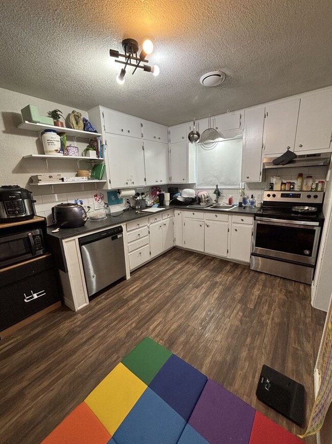 Building Photo - Updated 3-bedroom house with HUGE YARD!!