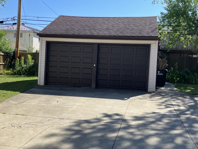 Garage -- Tenant parking in left side of garage - 129 Wendel Ave