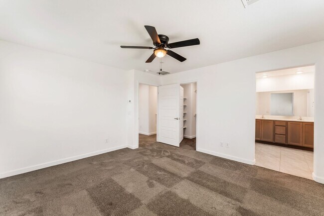 Building Photo - Modern Gated Townhome Living with Resort-Style Community Amenities