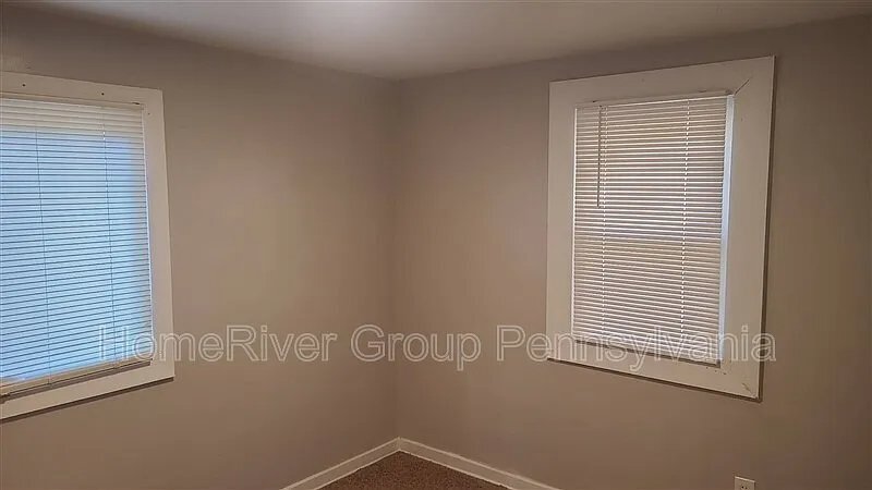 Building Photo - 6037 Poketa Rd