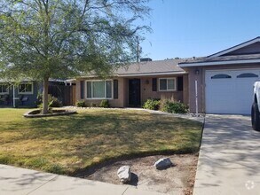 Building Photo - Charming 3 bedroom 2 bathroom home located...