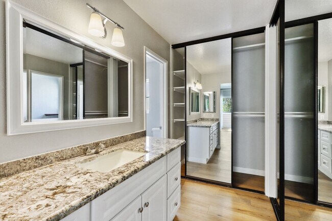 Building Photo - Top-Floor Condo in UTC – Updated and Move-...