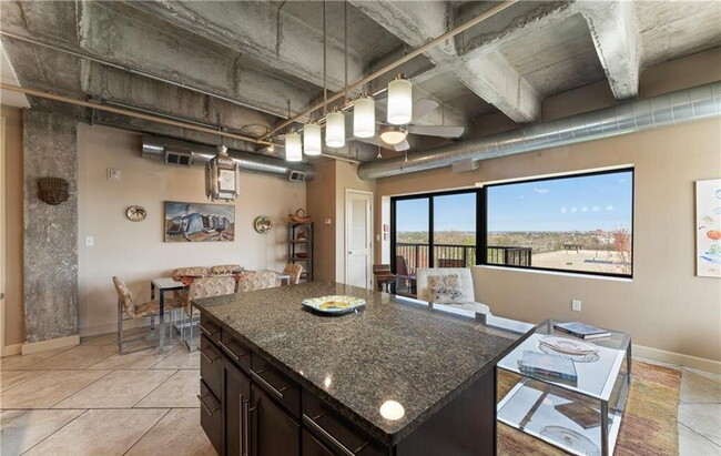 Building Photo - Contemporary Unit with High-End Features