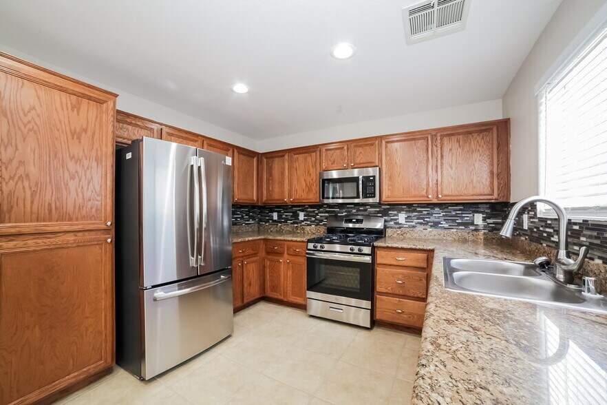 Building Photo - 8436 Walker Gardens Pl