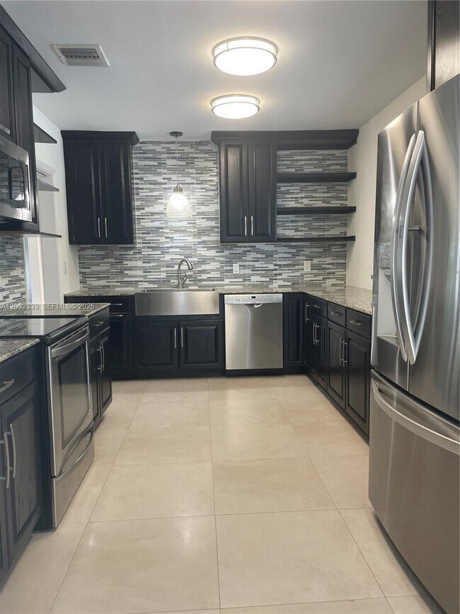 Building Photo - 9840 SW 69th Ave