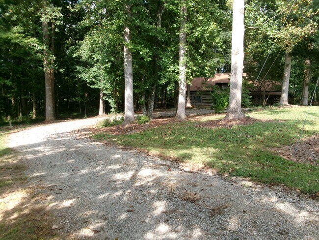 Building Photo - FOR RENT-Rustic log cabin home for RENT in...