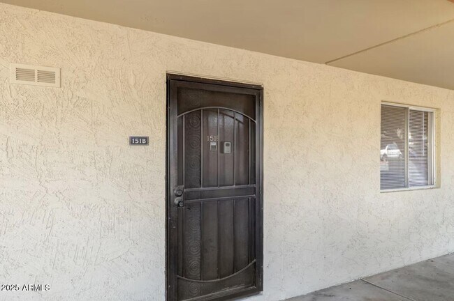 Building Photo - 7625 E Camelback Rd