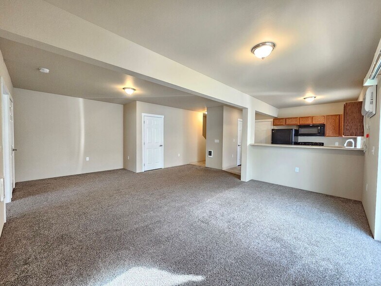 Building Photo - 5205 -5207  E. Upriver Dr.