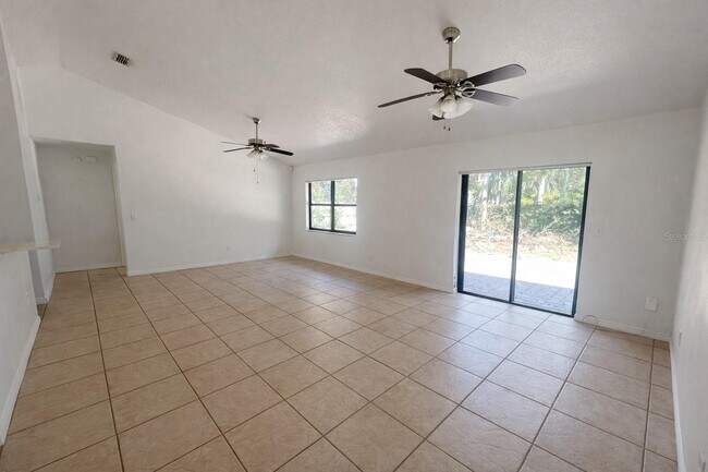 Building Photo - 9313 Palm Tree Dr