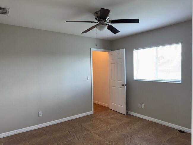 Building Photo - Experience this Cape Coral 3 bedroom 2 bath corner duplex with 1 car garage and screened in lanai.