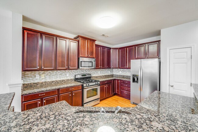 Building Photo - Townhomes at Ayrsley: Stunning 3-Bedroom Home with Modern Flair!