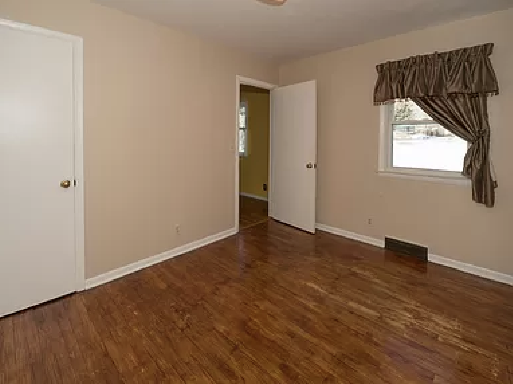 Bedroom, off kitchen, north side of home/window faces backyard - 8120 Burdette St