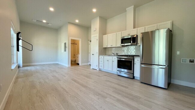 Building Photo - New Construction Studio Apartment with Air...