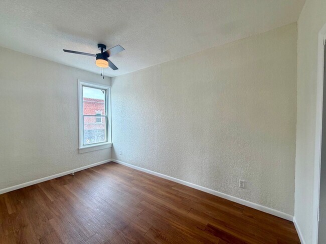 Building Photo - {2202 - A} Spacious Two Bedroom Condo in Historic Pendleton Heights Available Immediately