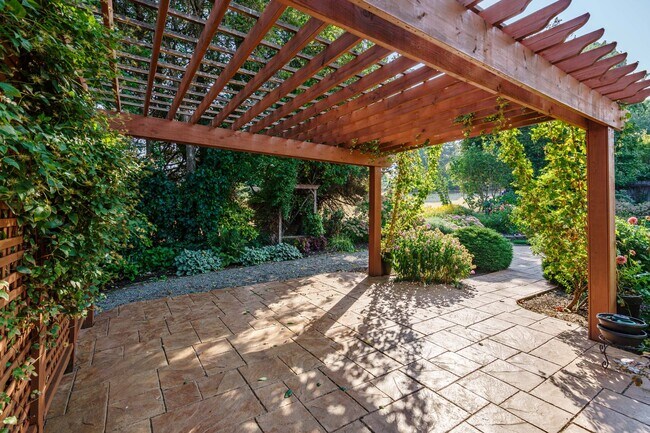 Building Photo - Beautifully Landscaped 1/4 acre with Well Maintained 4 bedroom 2 Bath Home with 3 Car Garage