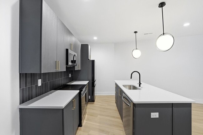 Building Photo - Bright, Open & Exceptionally Large—Your Ideal 2-Story Townhome