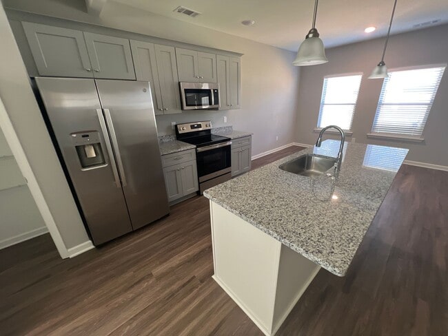 Building Photo - 4 bed, 2.5 bath house in Atoka built in 2022 now offering a move in gift card