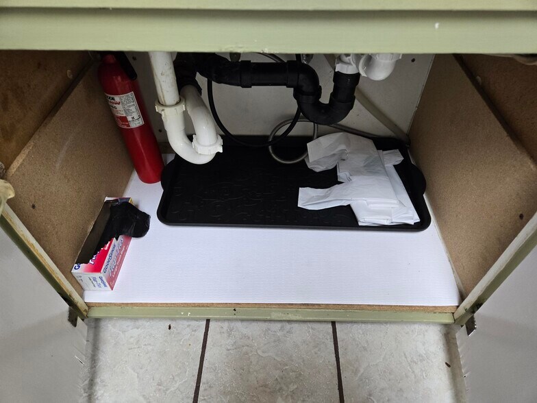 UNDER KITCHEN SINK - 511 Constitution Ave S