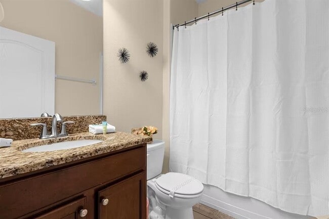 Building Photo - 8802 Bamboo Palm Ct