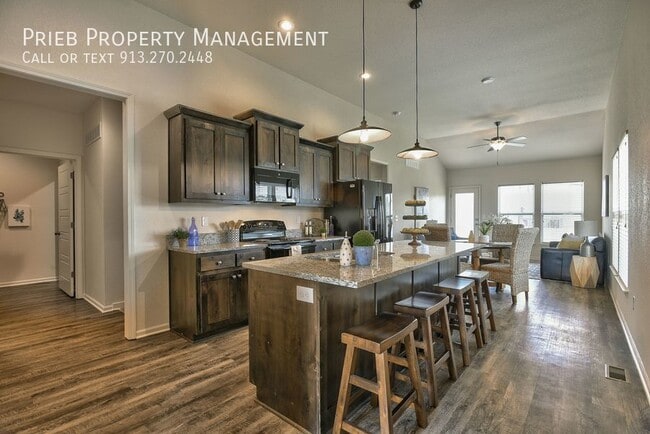 Building Photo - Reserve Townhome - Available June 9th