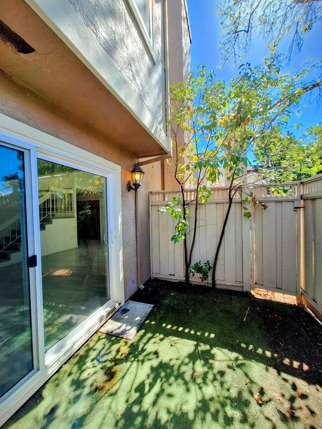 Building Photo - Spacious Two-Story 3bd Townhouse With Private Patios, Balcony, & Garage