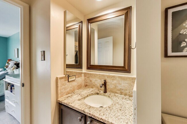 Building Photo - COMINGS SOON - Beautifully Updated Winchester-Built Townhome Backing to Serene Parkland.