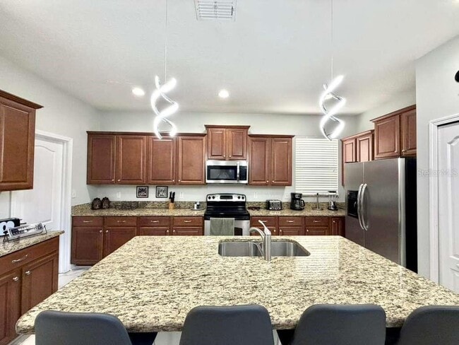 Building Photo - 8894 Candy Palm Rd