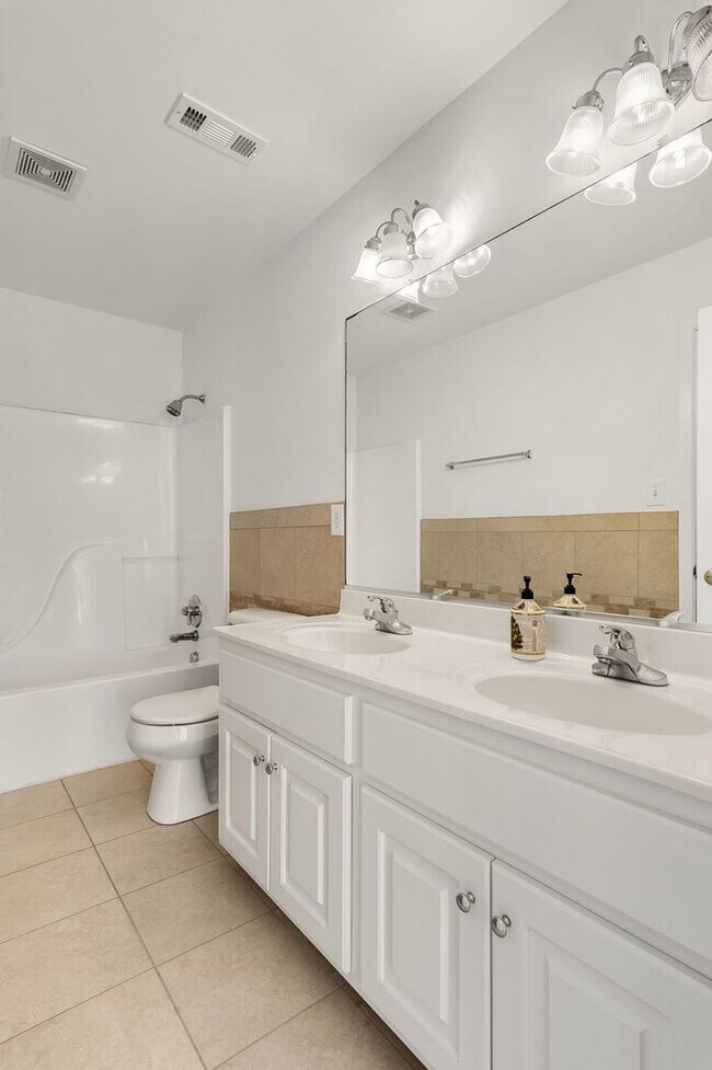 Building Photo - Spacious 5 Bedroom Home with 3rd Floor Suite, Fenced Yard & Community Amenities – $3,500/mo