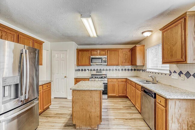 Building Photo - 6935 Moss Boulder Dr
