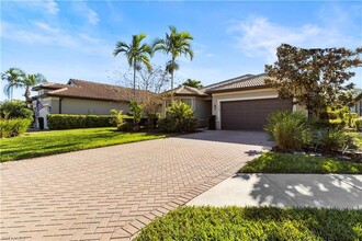 Building Photo - 6068 Triumph Ln