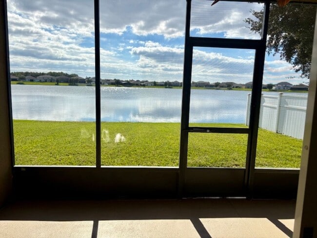 Building Photo - Water View 4/3 in Wyndham Lakes Estates ne...