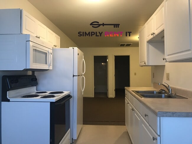 Building Photo - Affordable 1 Bedroom, Downtown Roland, Avail Now!