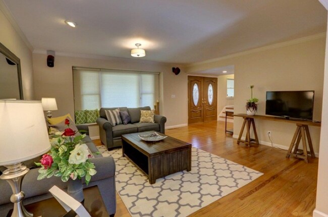 Building Photo - Executive 5BR Home with Private Backyard Retreat