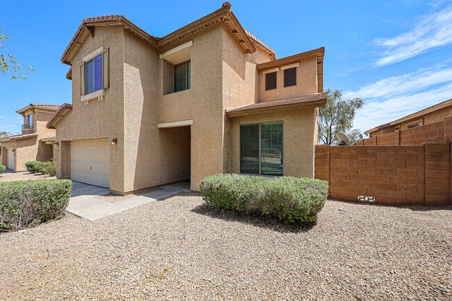 Building Photo - Welcome to this spacious 4 bedroom, 2.5 ba...