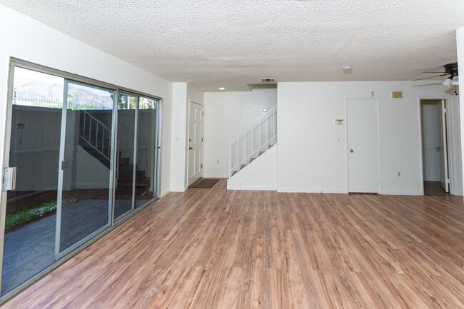 Building Photo - >>>>> TWO BEDROOM 1.5 BATHS TOWN-HOME STYL...