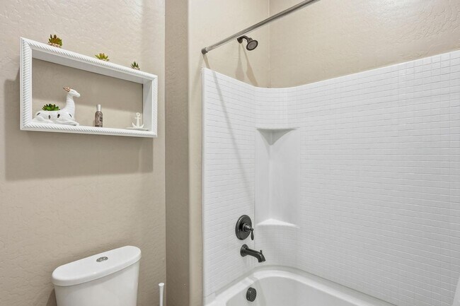 Building Photo - 10702 E Lumiere Ave