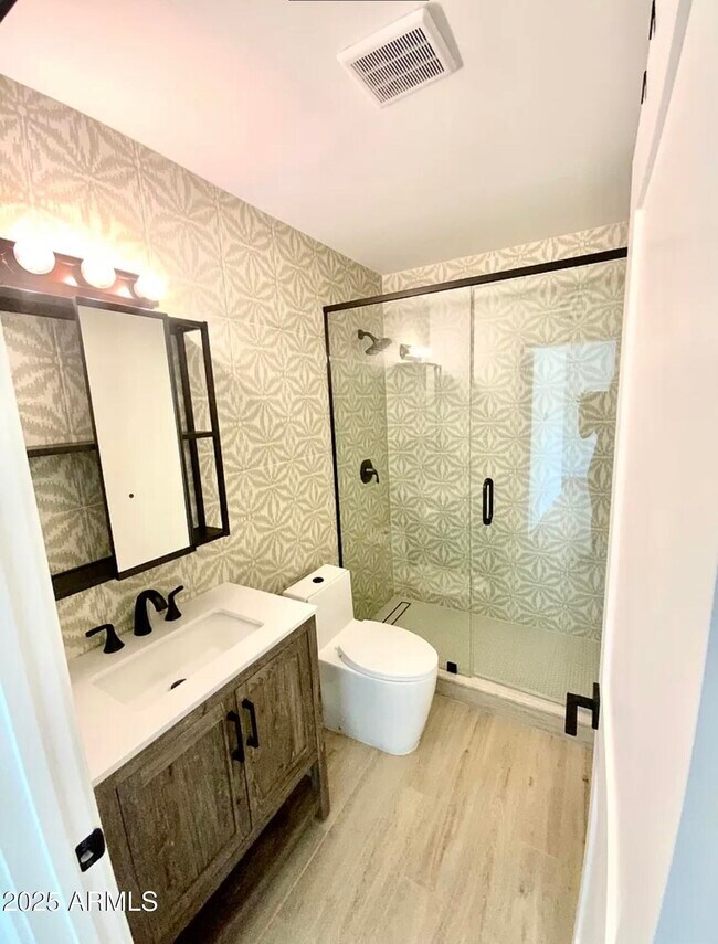 Building Photo - 5811 E Surrey Dr