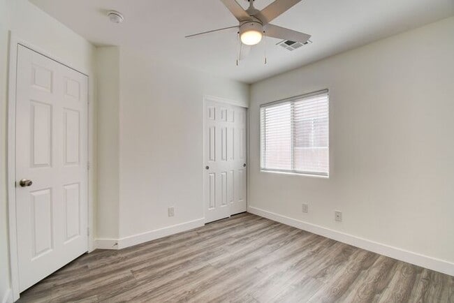 Building Photo - Great home with 4 bedrooms, 2.5 baths. New Floors Paint and Countertops.