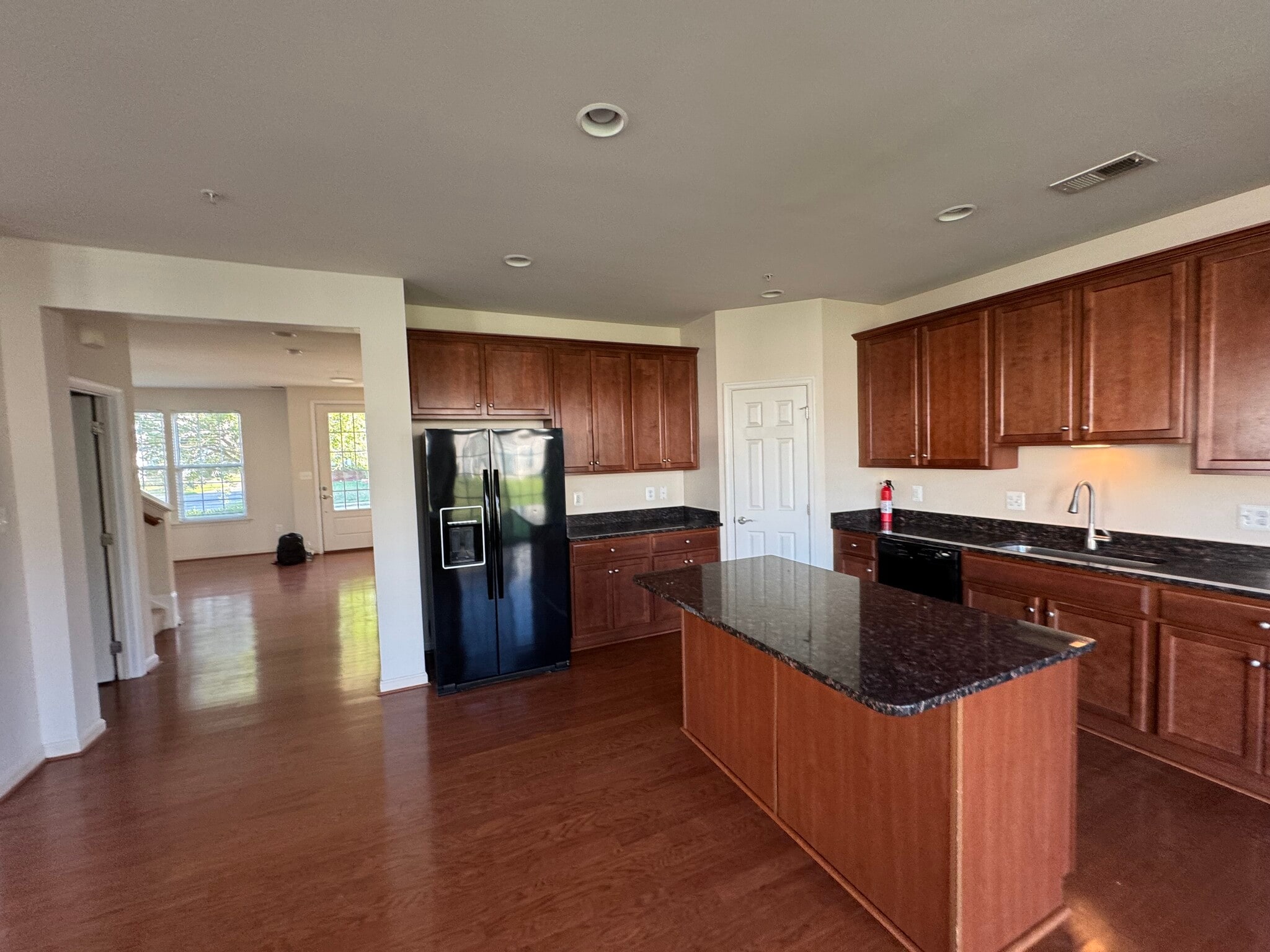 The kitchen has granite countertops, solid wood cabinets and premium Whirlpool appliances. - 44520 Gray Wolf St