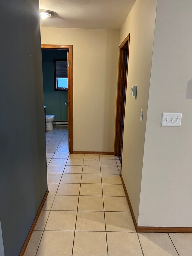 Hallway to bedrooms and bath - 935 Shamrock Ct