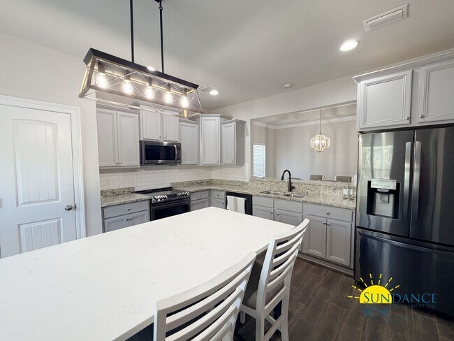 Building Photo - 210 Tropical Breeze Dr