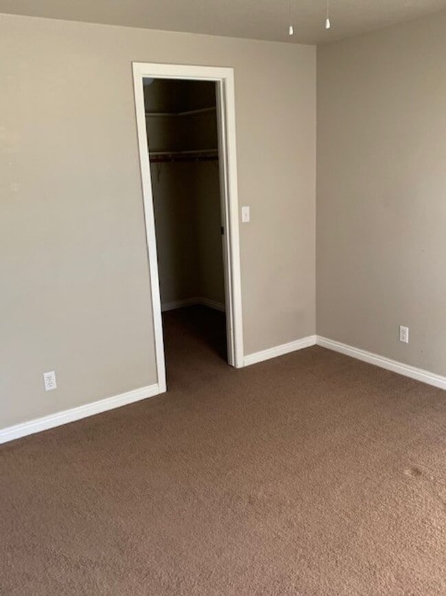 Building Photo - SpringTree Gardens Condominium