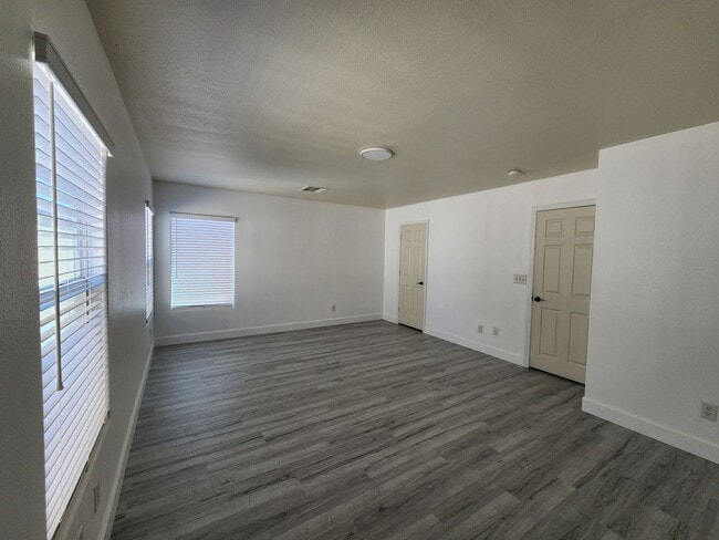 Building Photo - Sleek 2 story home with tile in most living areas and upgraded kitchen.