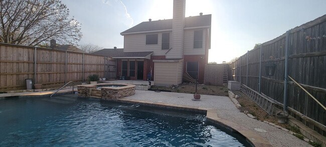 Building Photo - Spacious 4-Bedroom Home with Pool & Spa in...