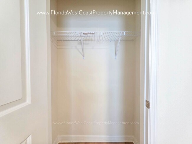 Building Photo - MOVE IN READY ! 4 BEDROOM/2 BATH! TILE- LVP THROUGHOUT! LAWN MOWING INCLUDED!