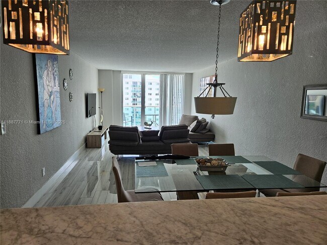 Building Photo - 19370 Collins Ave