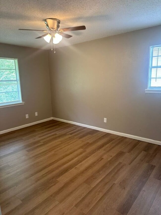 Building Photo - 4/1.5 PTISD Fenced yard and pet friendly