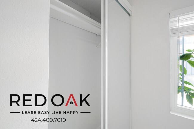 Building Photo - 7404 S Figueroa St